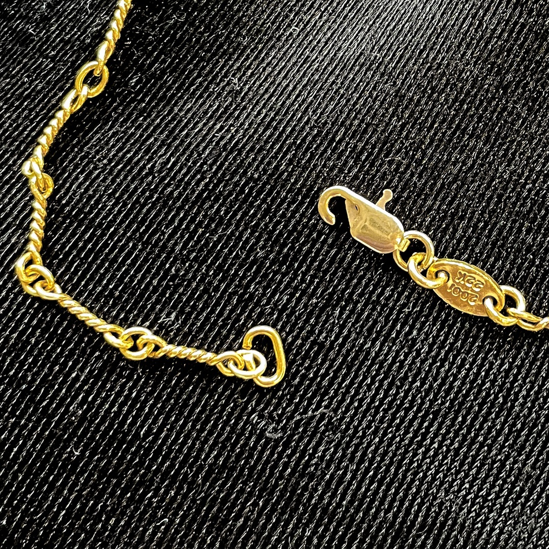 修理前のクロムハーツ22Kロールチェーン、留め具の輪っか部分が開いてしまった状態